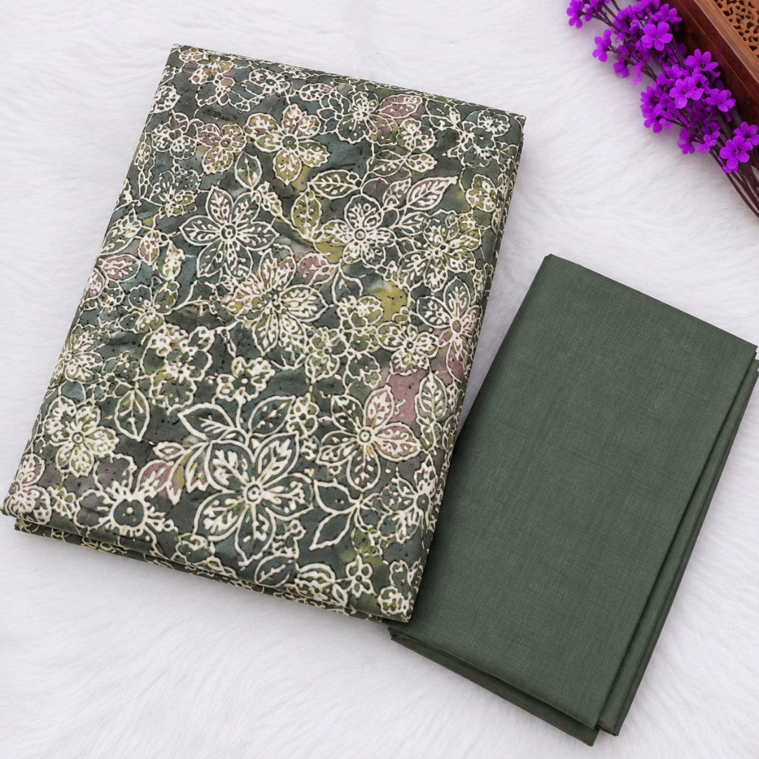 Premium olive green floral suit fabric with rhinestone neck work and coordinated ethnic wear styling