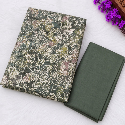 Premium olive green floral suit fabric with rhinestone neck work and coordinated ethnic wear styling