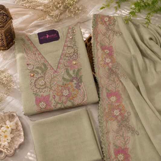 Botanical embroidered olive green Mul Chanderi suit set with detailed floral neckline and designer embroidered dupatta
