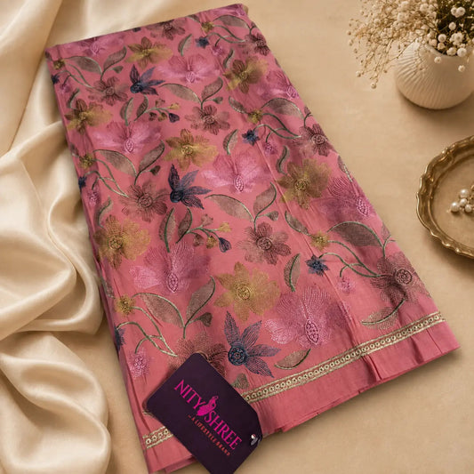 Dusty pink mul cotton suit set with floral thread work, decorative border, soft breathable fabric and premium unstitched ethnic wear for women by Nityashree