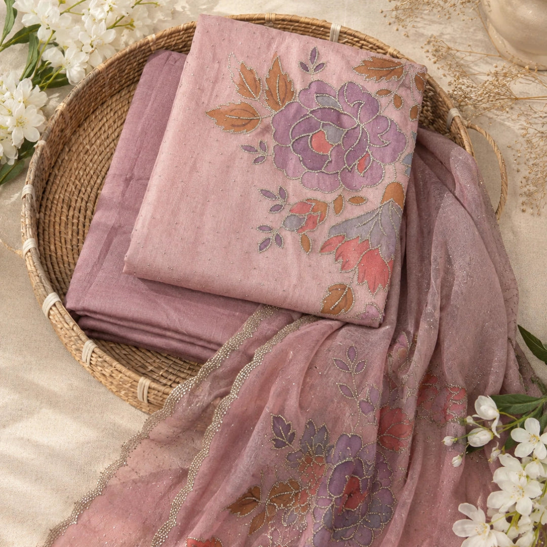 Dusty pink Swarovski embellished suit set with floral detailing, premium unstitched suit fabric for women by Nityashree