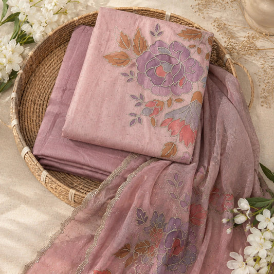 Dusty pink Swarovski embellished suit set with floral detailing, premium unstitched suit fabric for women by Nityashree