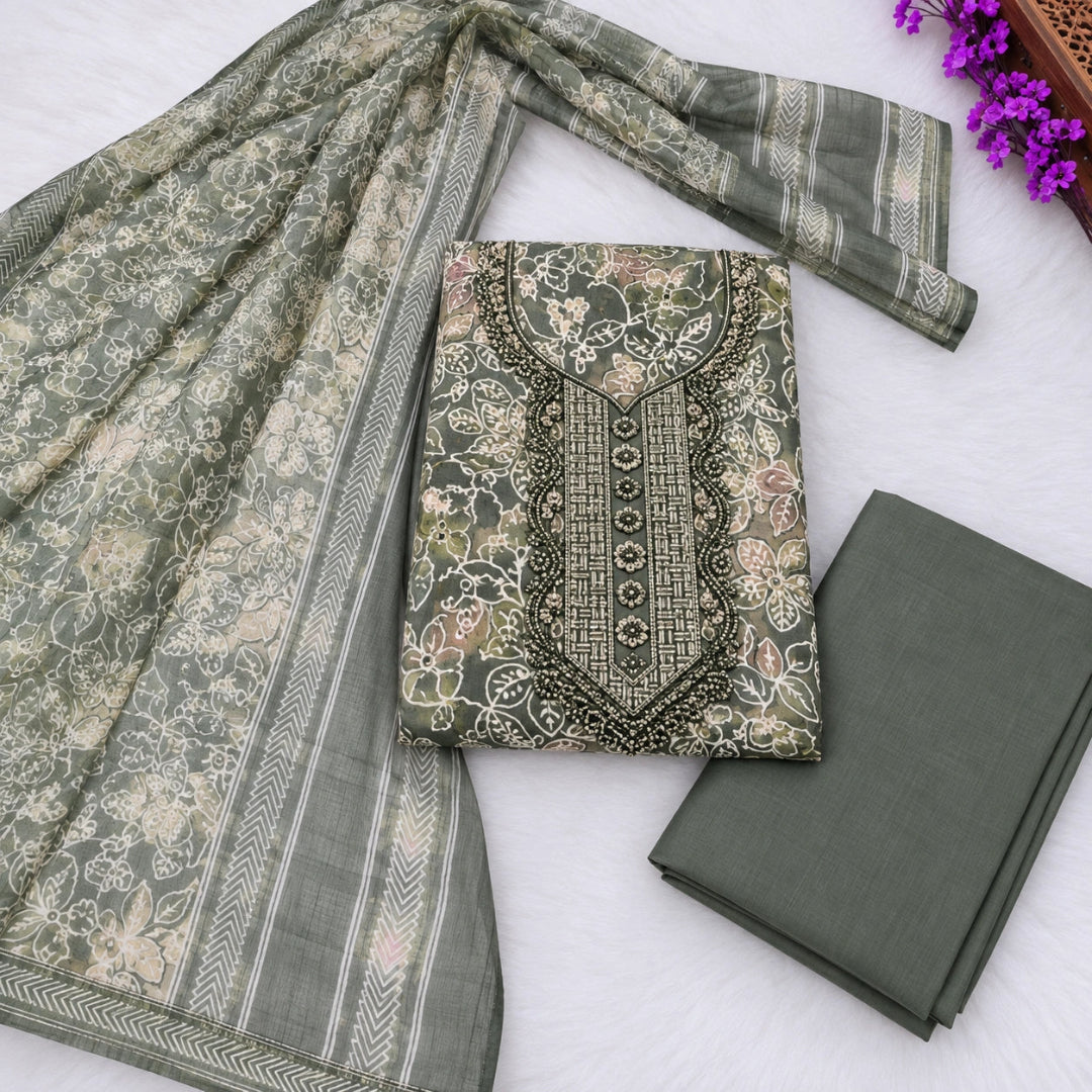 Olive green floral printed suit set with designer rhinestone detailing, matching plain bottom and soft dupatta.