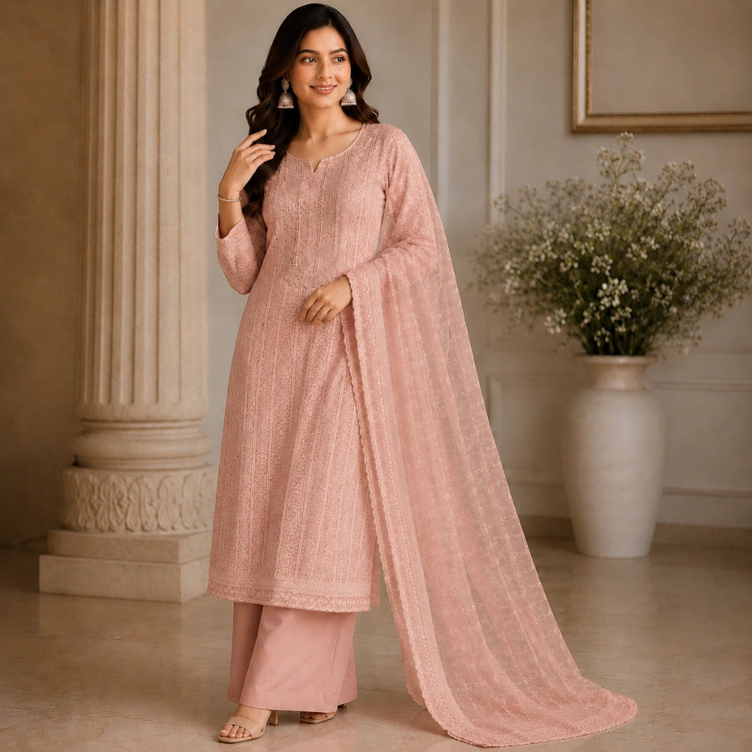 georgette suit set featuring intricate Chikankari embroidery, embroidered neckline and elegant net dupatta