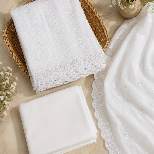 White embroidered Chikankari suit fabric with scalloped dupatta and sophisticated ethnic wear styling