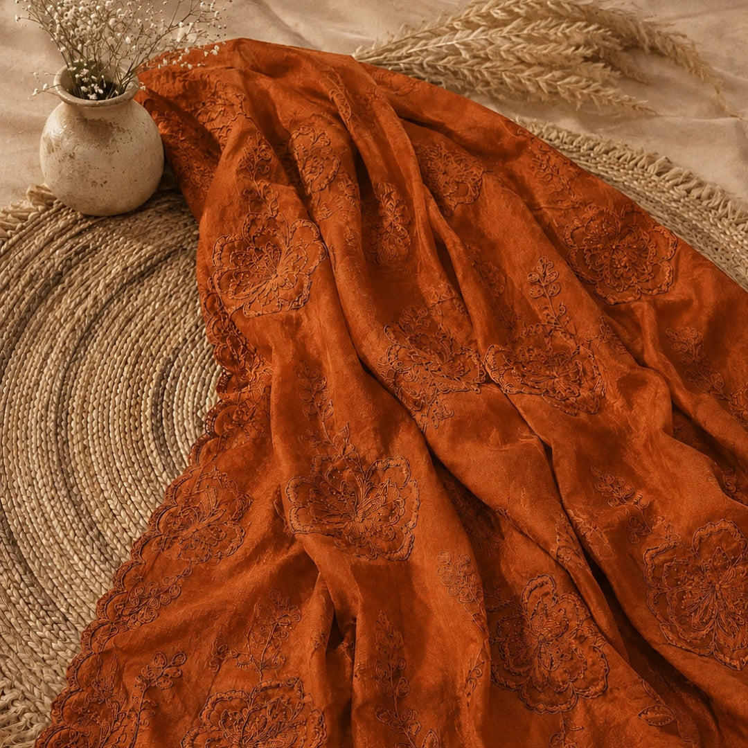 Rust orange pure organza suit set with floral thread embroidery, designer dupatta and premium ethnic wear fabric for women
