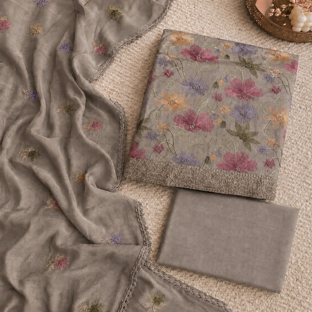 Taupe grey Jam cotton suit set with multicolor floral thread work and coordinated plain bottom fabric