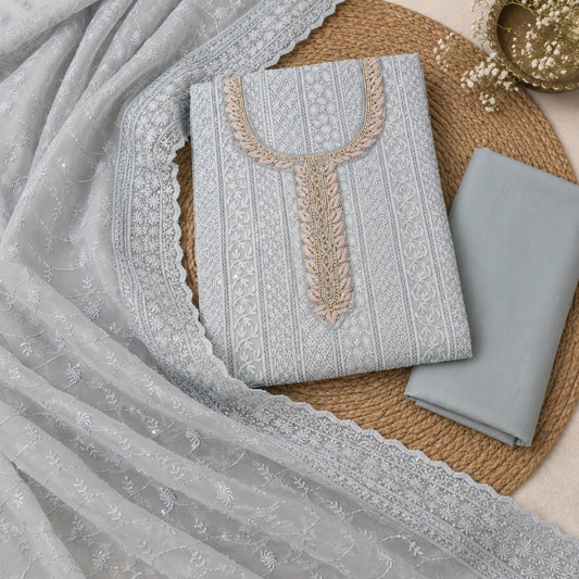 Icy grey embroidered suit fabric featuring Chikankari inspired work, designer neckline and elegant embroidered dupatta