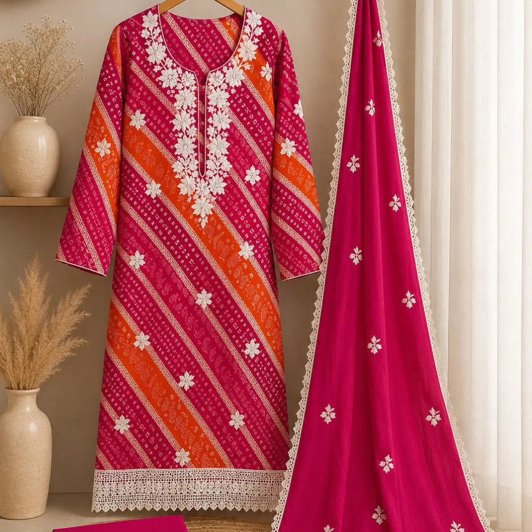 Orange and pink Bandhani suit set with ivory floral embroidery, traditional motifs and premium unstitched suit fabric for women by Nityashree