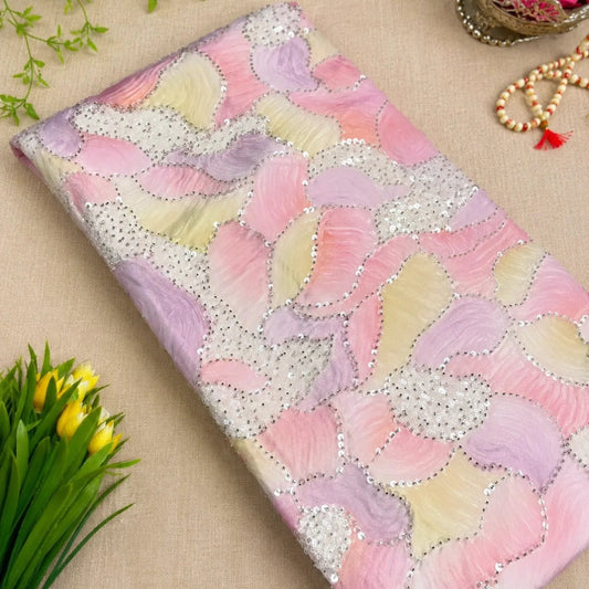 Pastel floral sequins georgette suit set with blush pink, lavender, peach and soft yellow tones, embellished ethnic wear for women by Nityashree