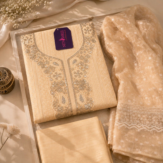 Peach beige embroidered suit fabric with Chikankari-inspired floral motifs, zari detailing