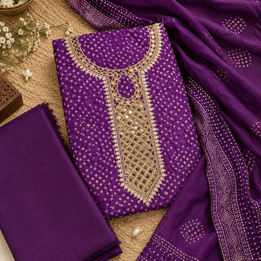 Deep purple Bandhani suit fabric with mirror work neck panel, golden embroidery and traditional ethnic styling