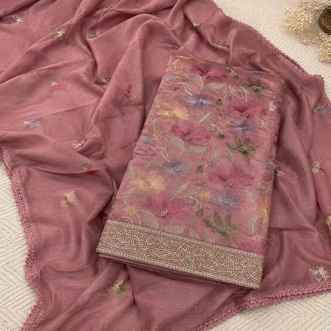 Dusty rose embroidered cotton suit fabric with floral motifs, decorative border and designer dupatta