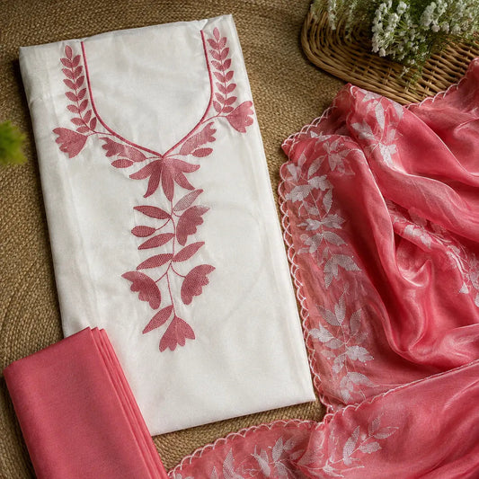 Rosy pink Vichitra silk suit set with beaded floral work, embellished neckline, plain shantoon bottom and scalloped dupatta