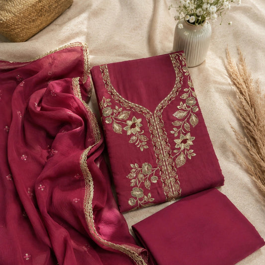 Ruby red floral embroidered suit set with antique embroidery, premium unstitched suit fabric and wedding wear styling for women by Nityashree
