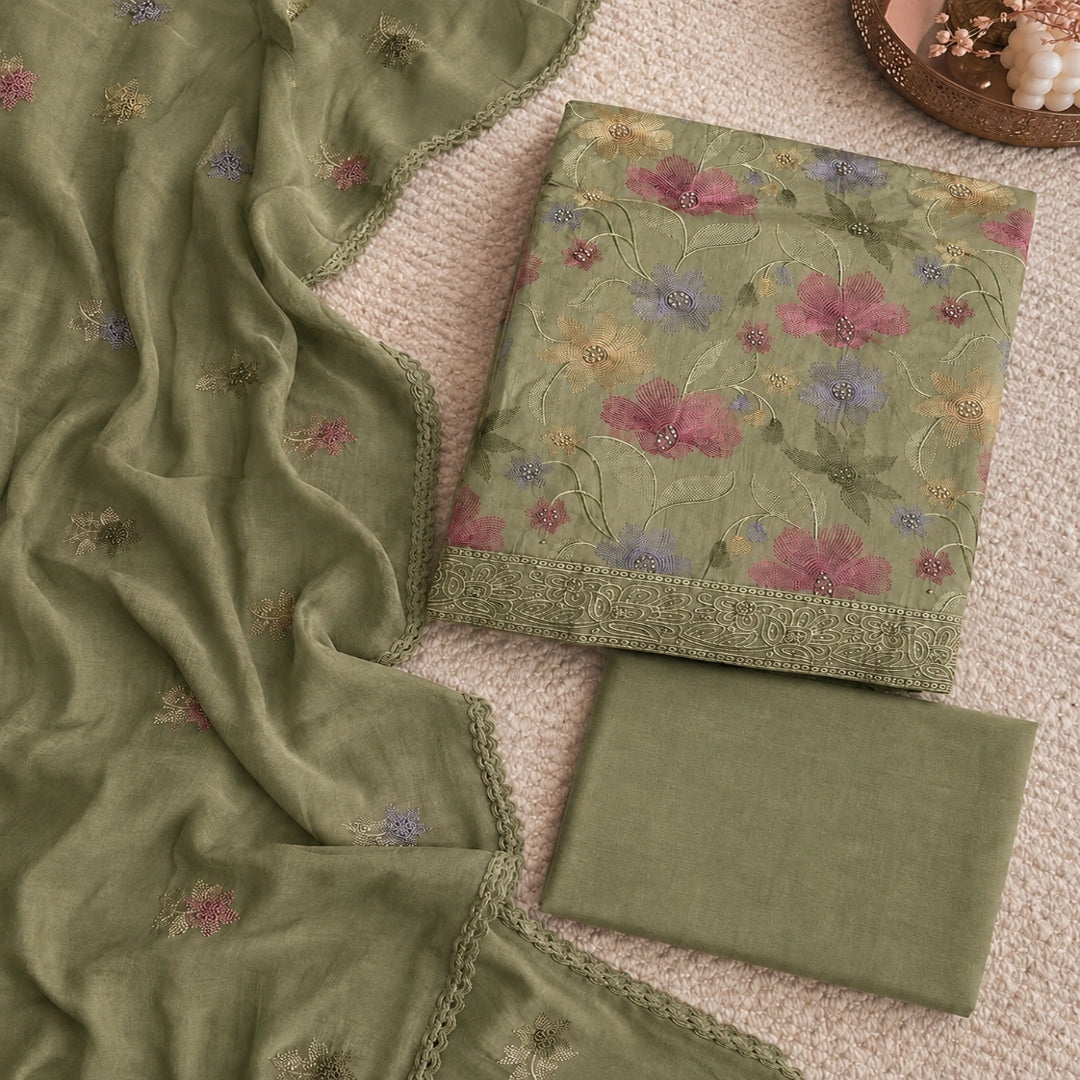 Sage green embroidered cotton suit fabric with floral thread work motifs and elegant designer dupatta