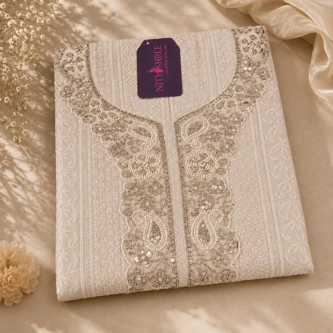 Soft taupe beige Chikankari suit set with floral embroidery, zari work, embroidered dupatta and premium unstitched ethnic wear