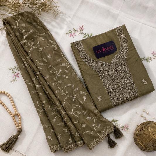 Steel grey unstitched suit set with golden booti motifs, floral gold embroidery and premium ethnic wear fabric for women by Nityashree