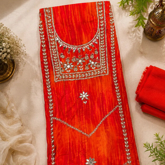 Sunset orange embroidered suit fabric with metallic detailing, floral motifs and ornate embellished.