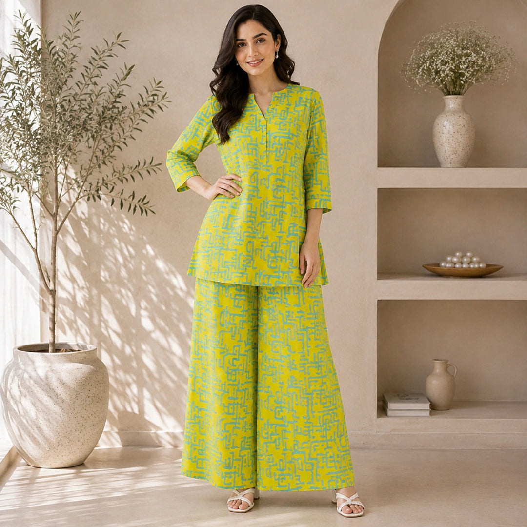 Modern abstract print suit fabric in lime yellow and turquoise with all-over geometric pattern for casual wear