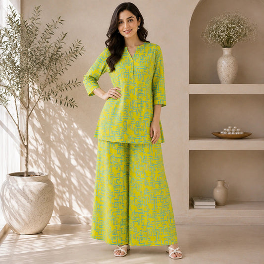 Modern abstract print suit fabric in lime yellow and turquoise with all-over geometric pattern for casual wear